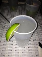 cup of water with a lemon slice at Sandbar picture